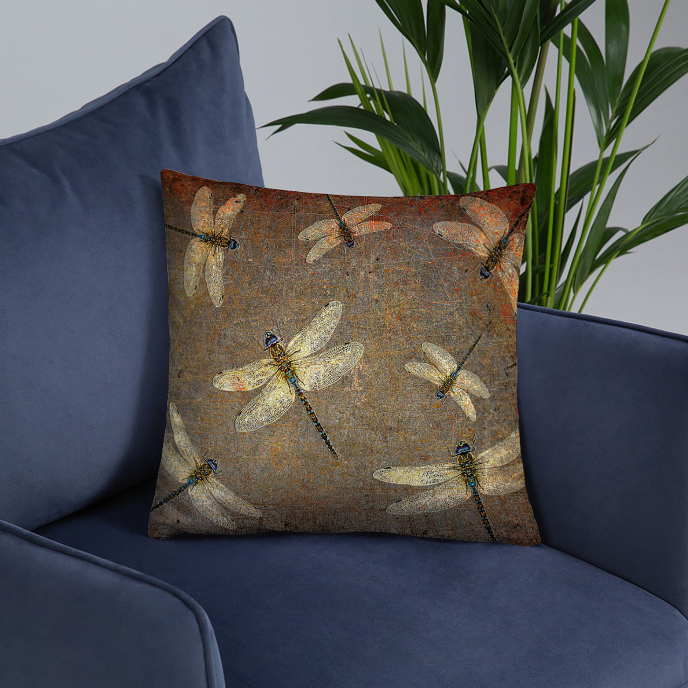 Large Throw Pillow Silver Dragonflies on Distressed Background Print on blue armchair