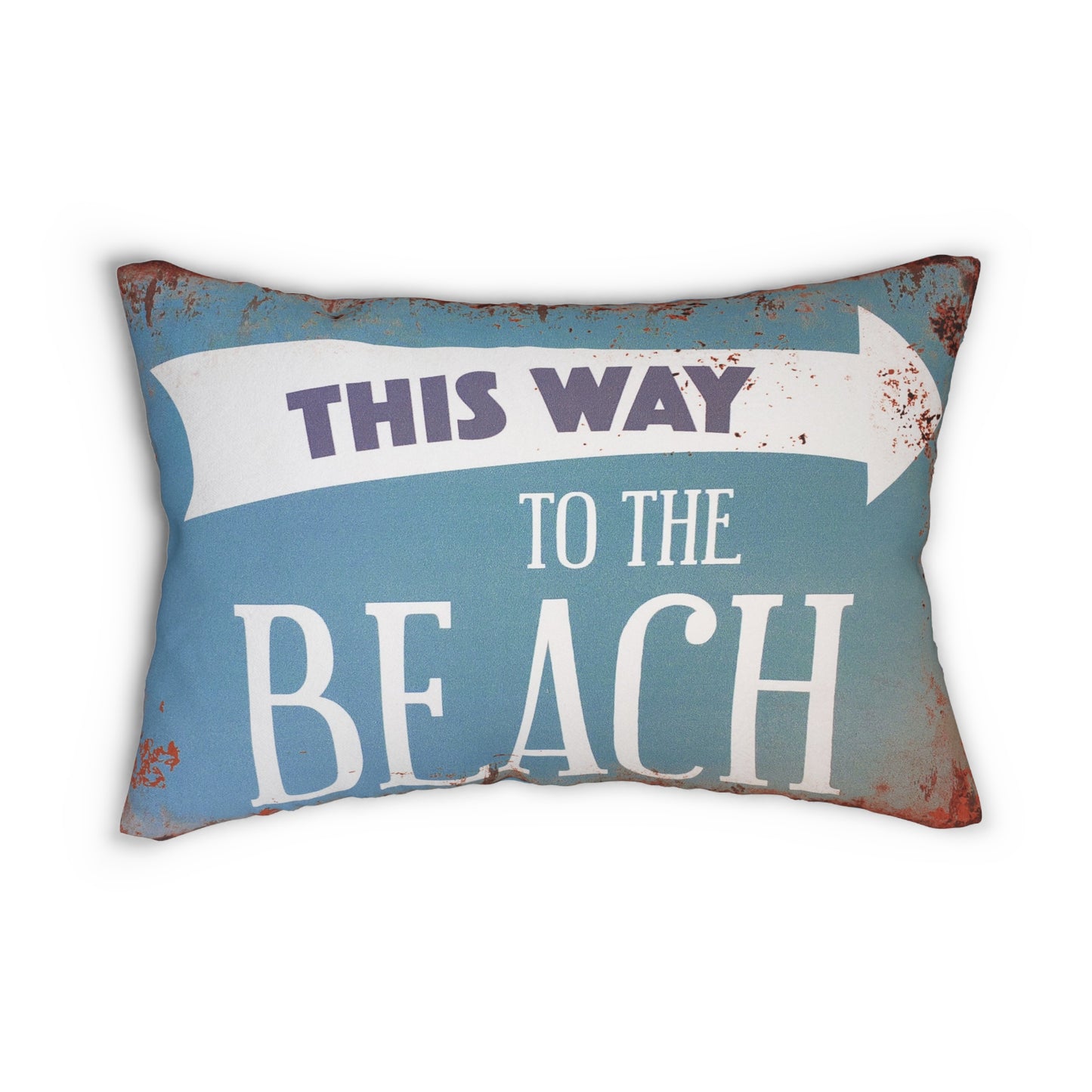 Decorative pillow with 'This Way to the Beach' text on a blue background