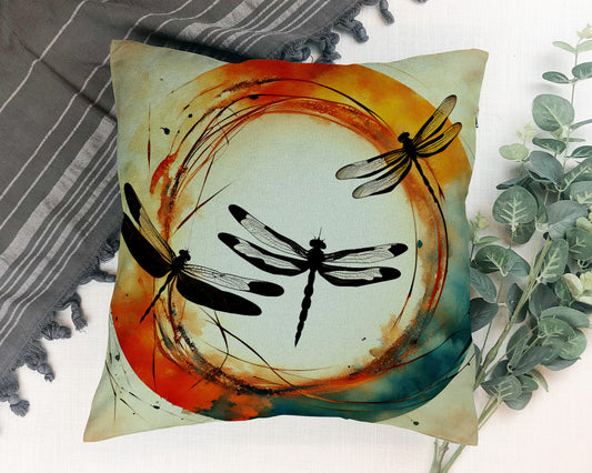 Dragonflies Silhouettes in a colorful Enso circle print on Polyester Square Pillow on floor