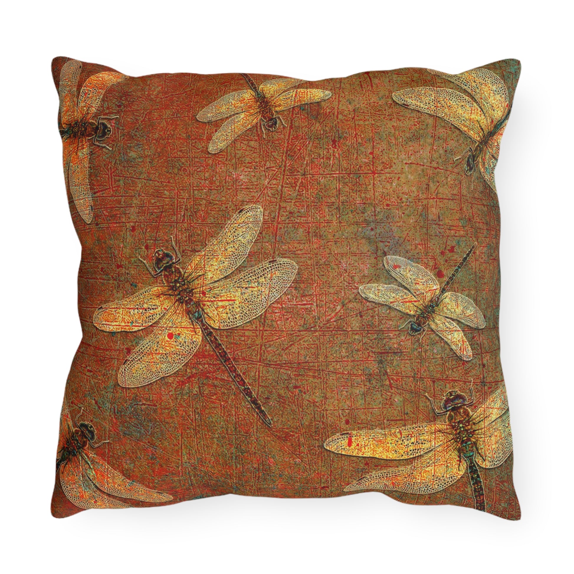 Decorative pillow with dragonfly pattern on a textured brown background