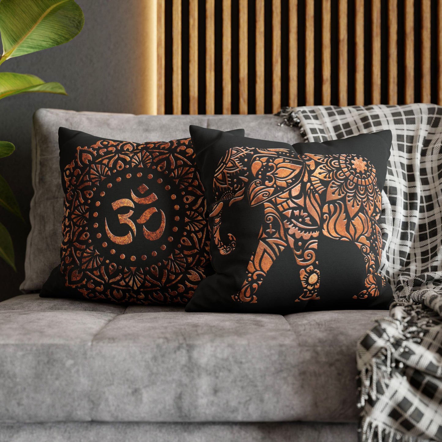 Double Sided Copper Color Elephant and Om Symbol Mandala style on Black Background front and back on sofa