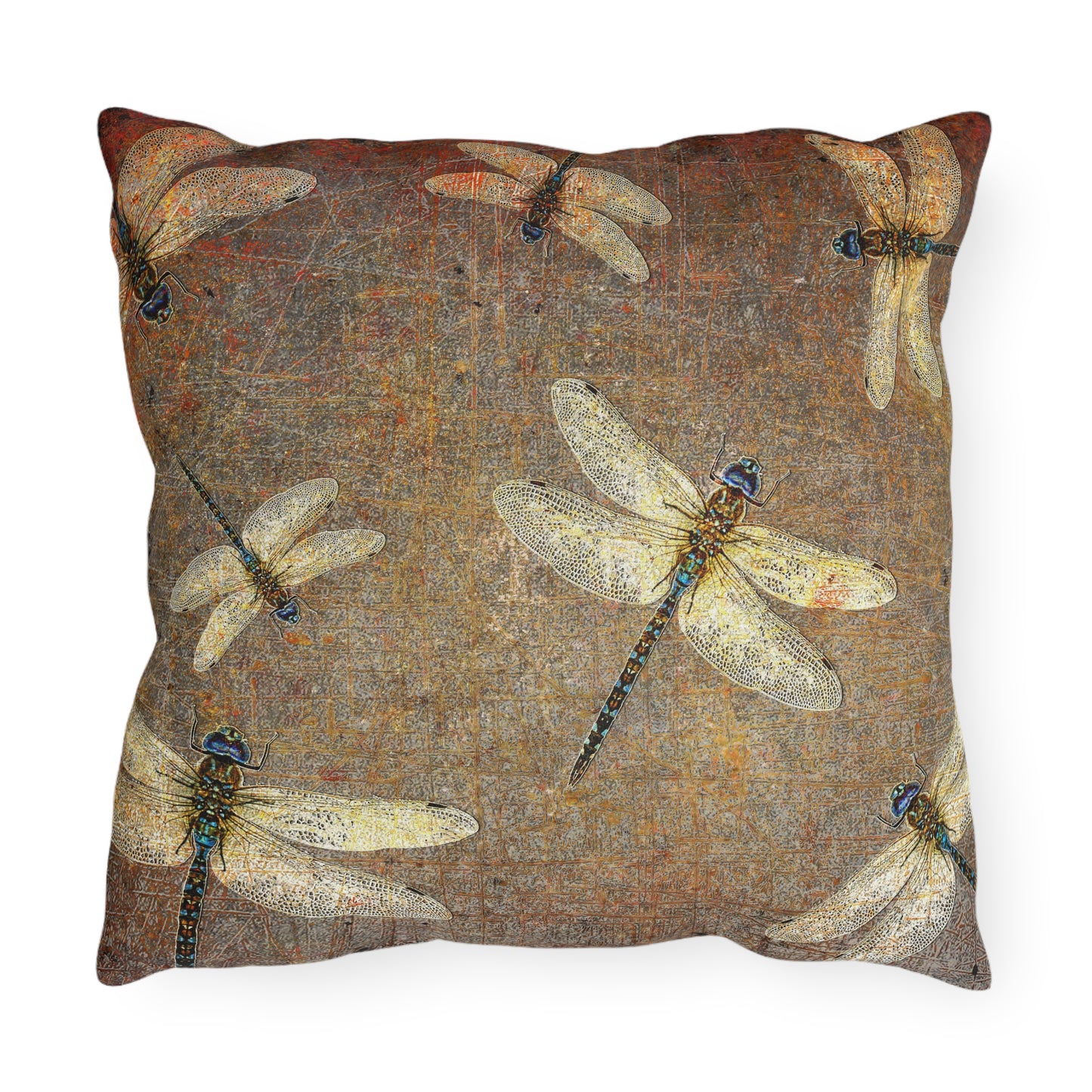 Decorative pillow with dragonfly pattern on a textured brown background