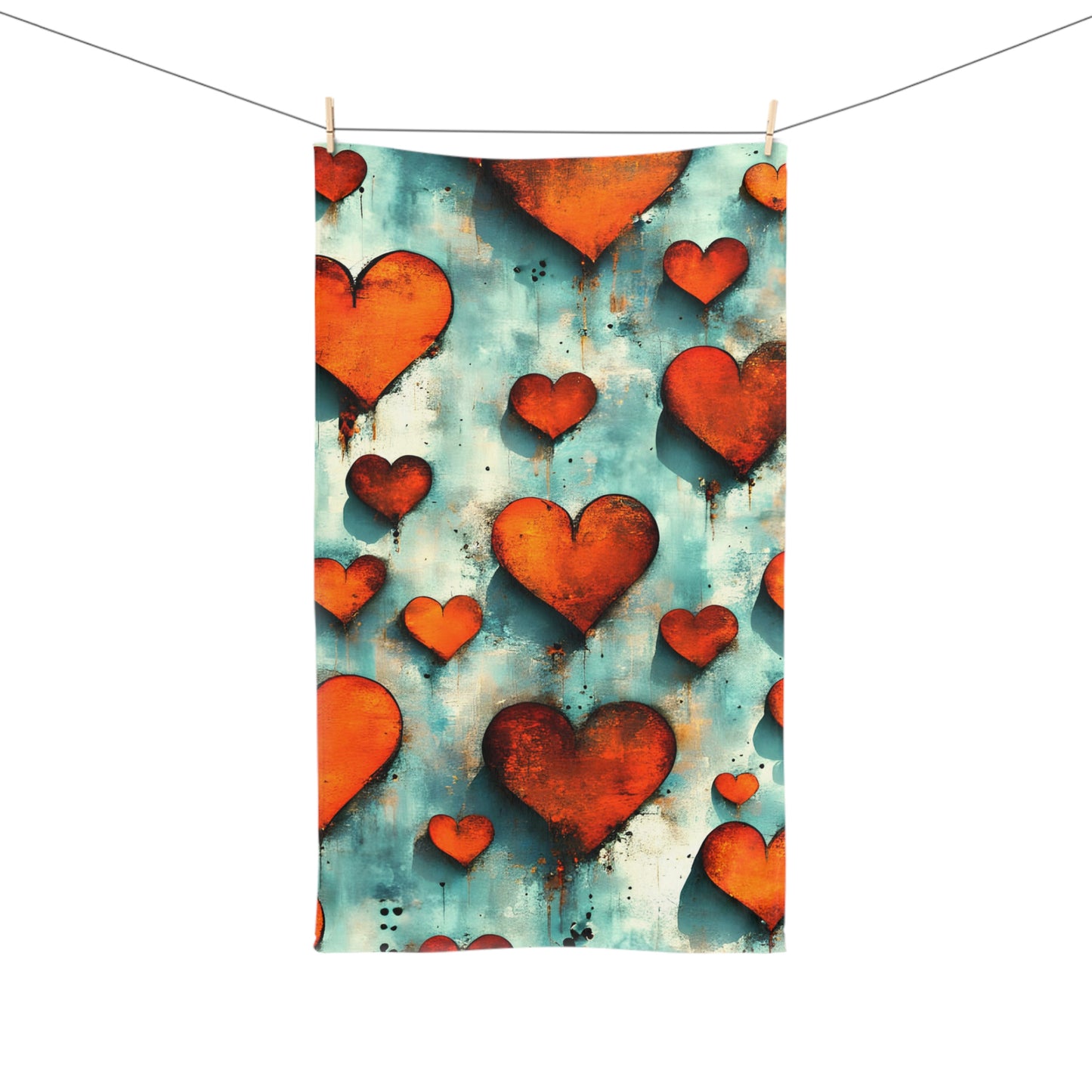 Tea towel with red heart pattern on a blue and orange background