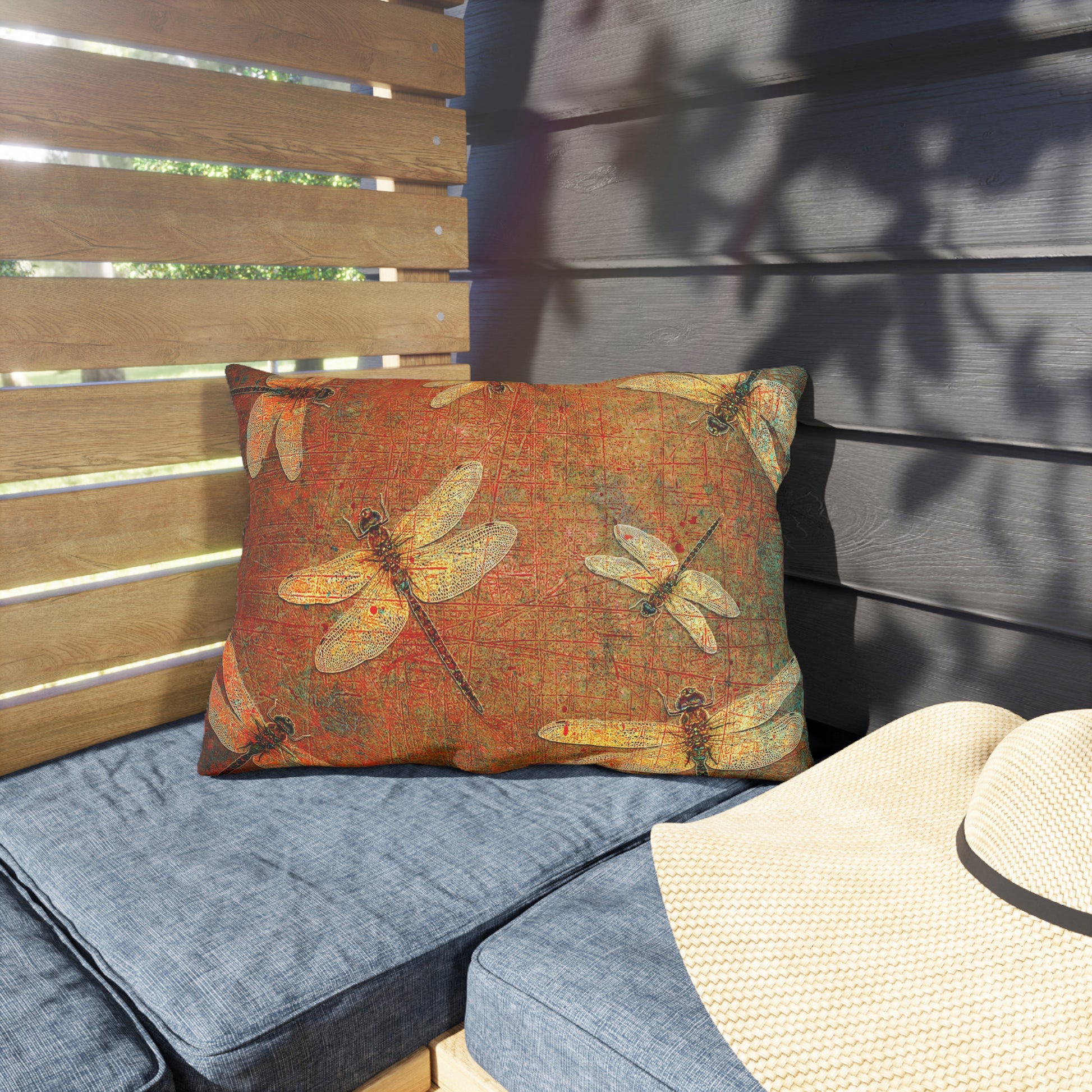 Rectangular Outdoor Pillows Golden Dragonfly on Distressed Orange Background on patio Back View