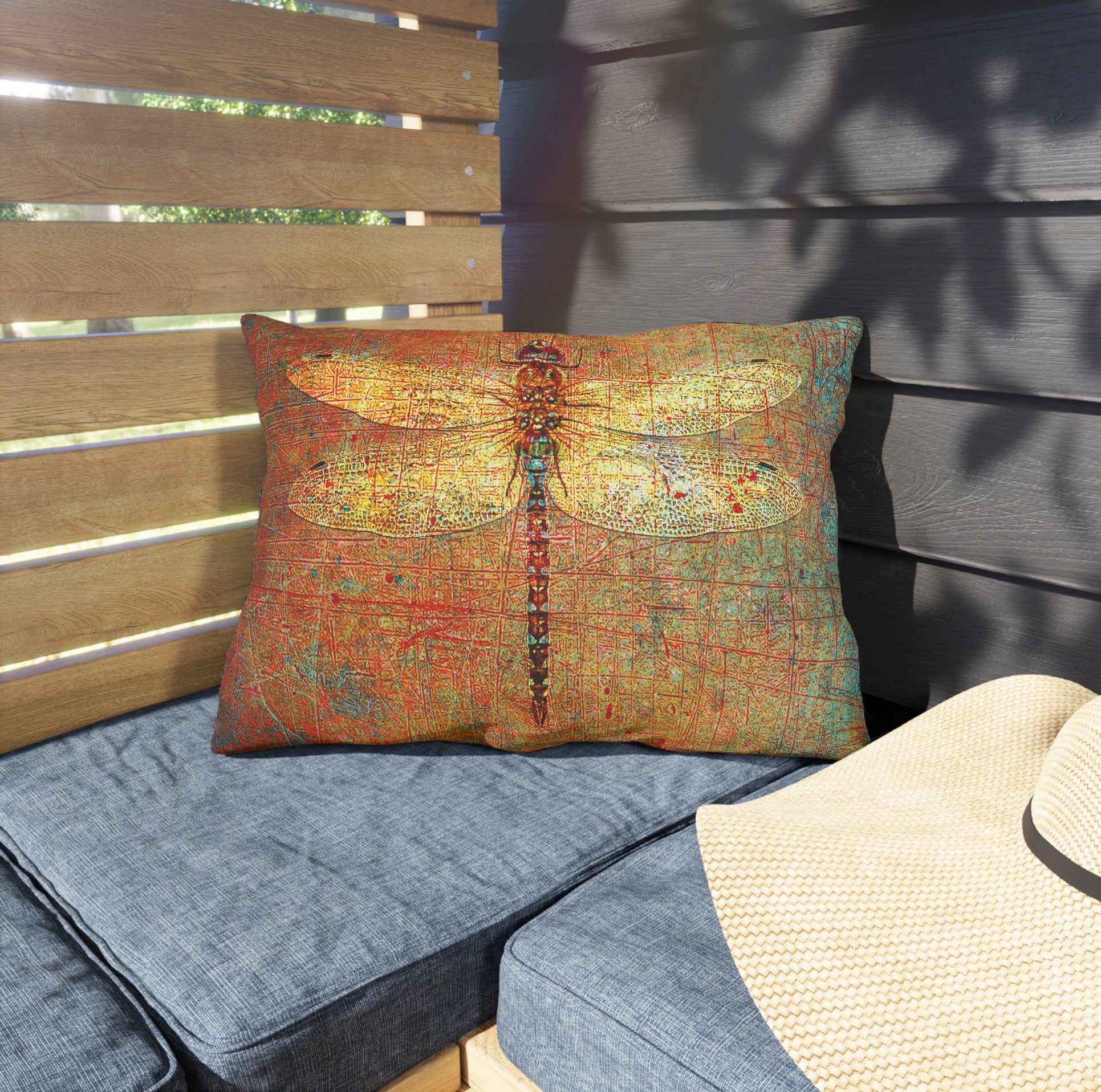 Rectangular Outdoor Pillows Golden Dragonfly on Distressed Orange Background on patio front View