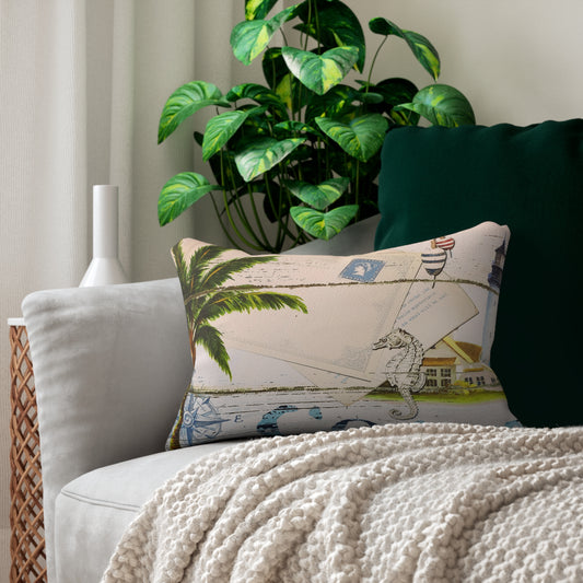 Decorative pillow with a palm tree design on a couch with a plant in the background