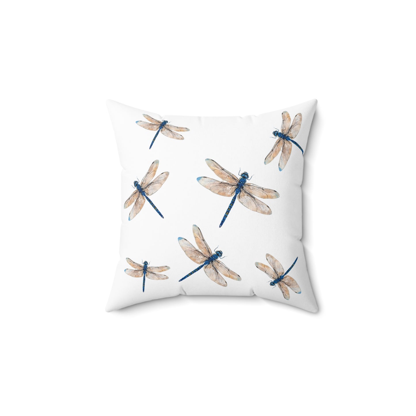 Pillow with dragonfly pattern on a white background