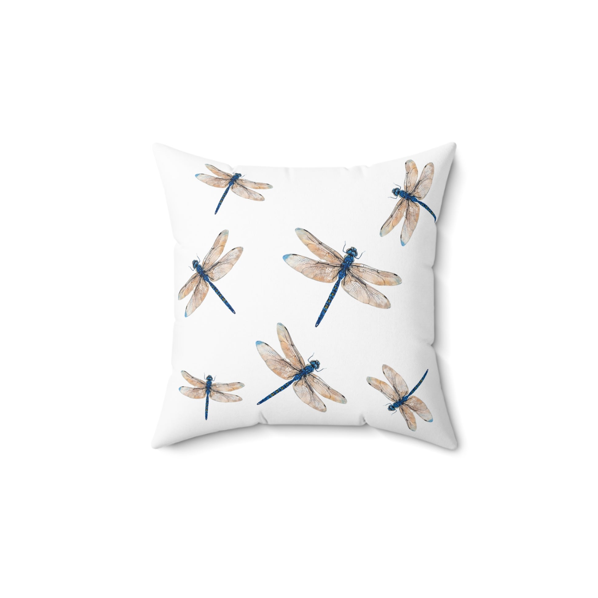 Pillow with dragonfly pattern on a white background