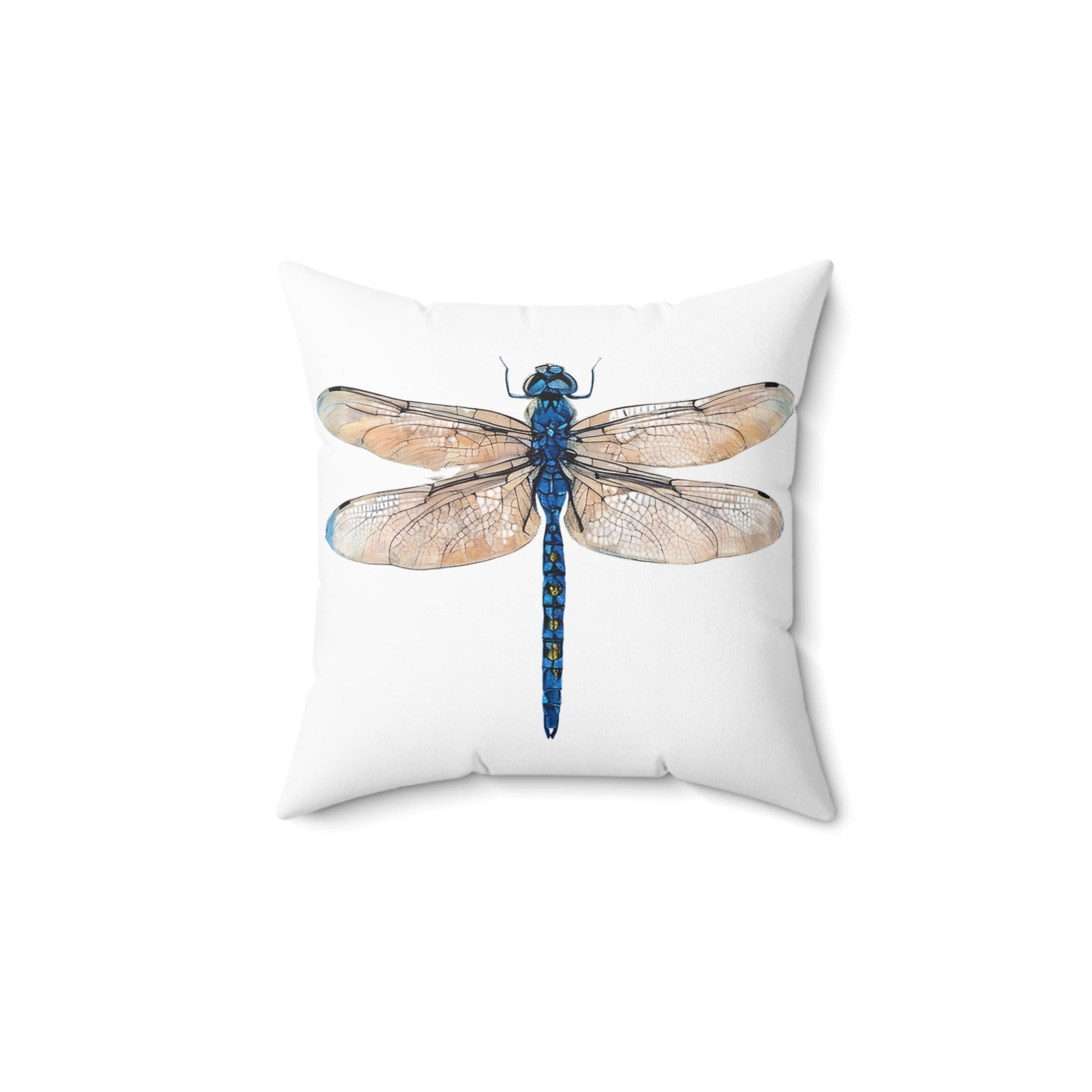 Pillow with a dragonfly design on a white background