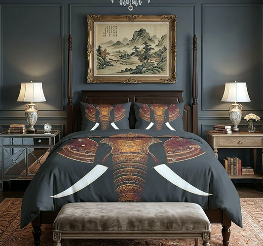 A styled bedroom featuring a bed dressed in a dark gray bedding set with a large, detailed graphic print of an elephant head and tusks. The room is decorated with a dark blue paneled wall, a framed landscape painting, matching bedside tables, lamps, and a velvet bench at the foot of the bed.