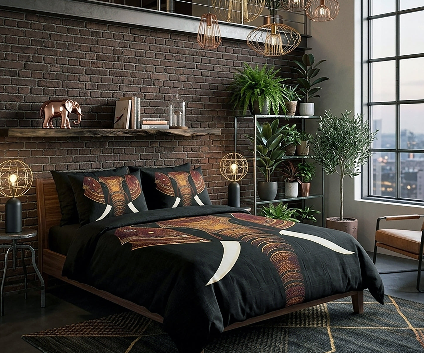 A bed dressed in a black duvet cover and matching pillow shams, featuring a large elephant print in earthy brown, beige, and rust tones. The bed is styled in a modern bedroom with a dark brick wall, shelving, plants, pendant lights, and a large window.
