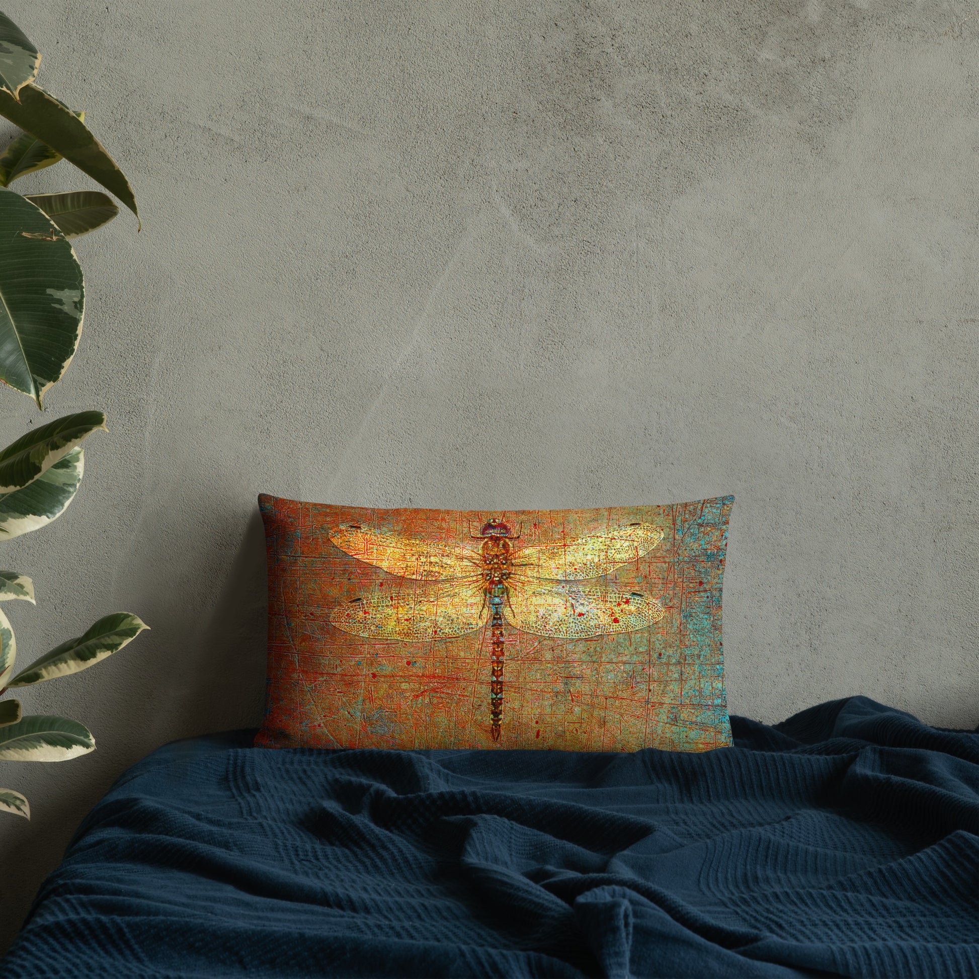 Double Sided Dragonflies Themed Premium Lumbar Pillow 20x12 - Golden Dragonflies on Orange and Green Background Front against wall