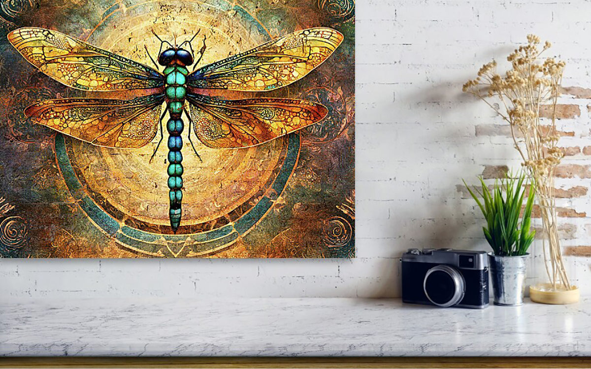 Colorful dragonfly painting on a textured wall with a camera and plant below.