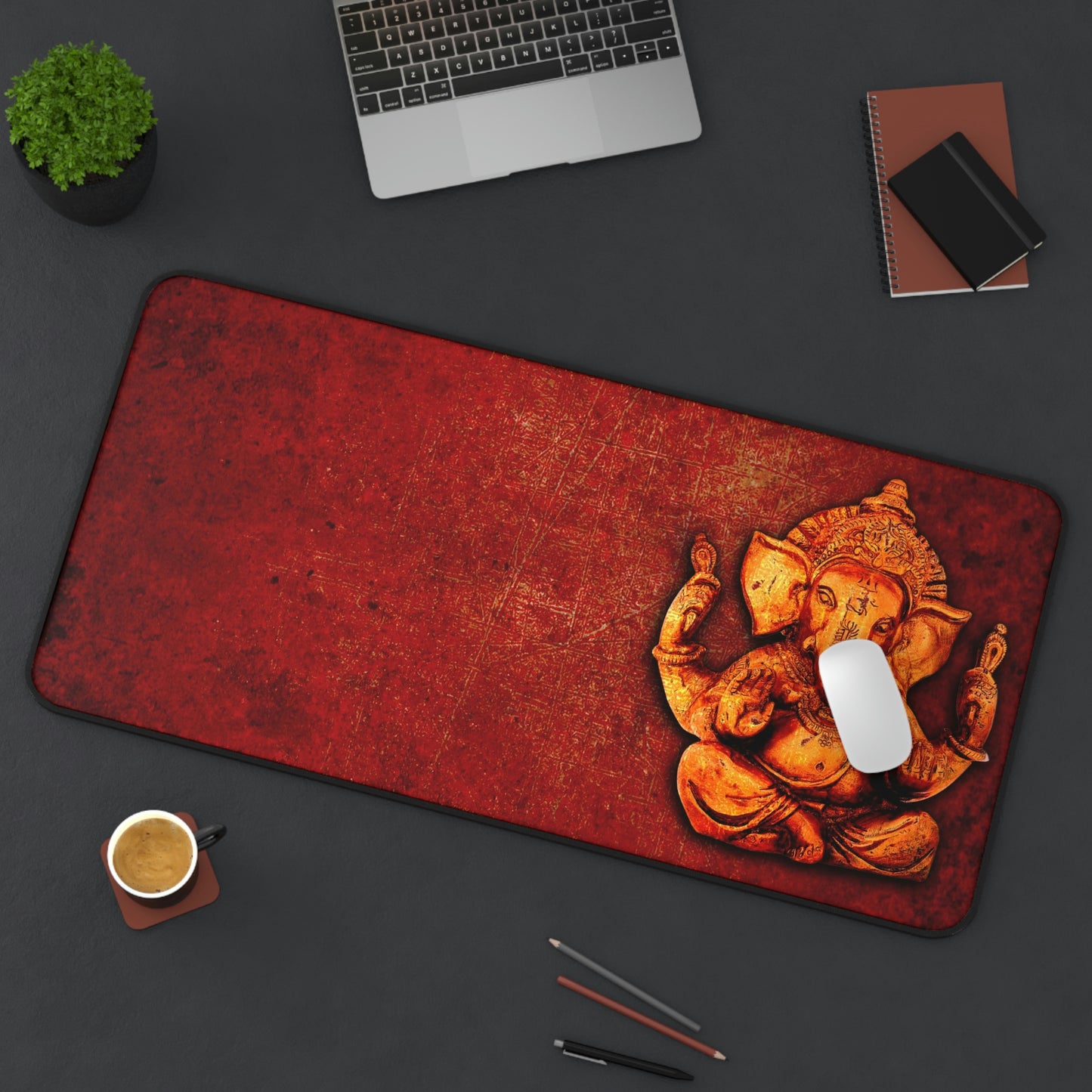 Gold Ganesha on Lava Red Background Print on Neoprene Desk Mat 15.5 by 31 in situ