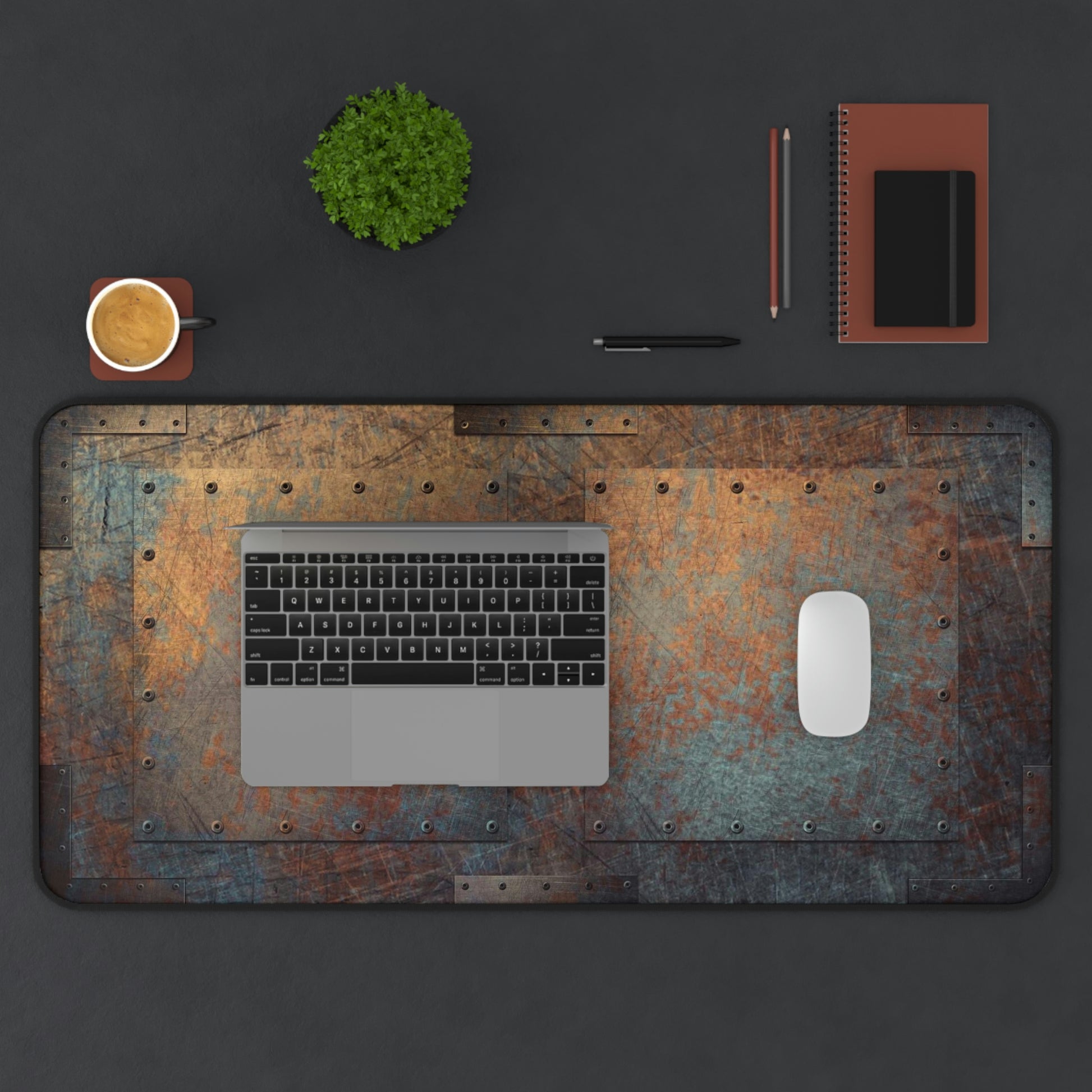 Steampunk Themed Desk Accessories - Patinated, Weather Beaten, Riveted Copper Sheets Print on Neoprene Desk Mat 15.5 x 31 in situ with laptop