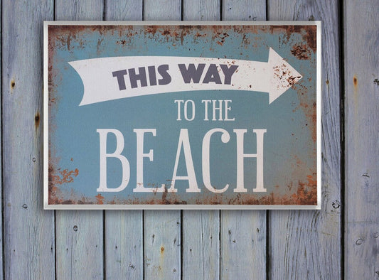 Beach House Decor - This Way To The Beach Print Floating Frame Stretched Canvas hung on wooden wall