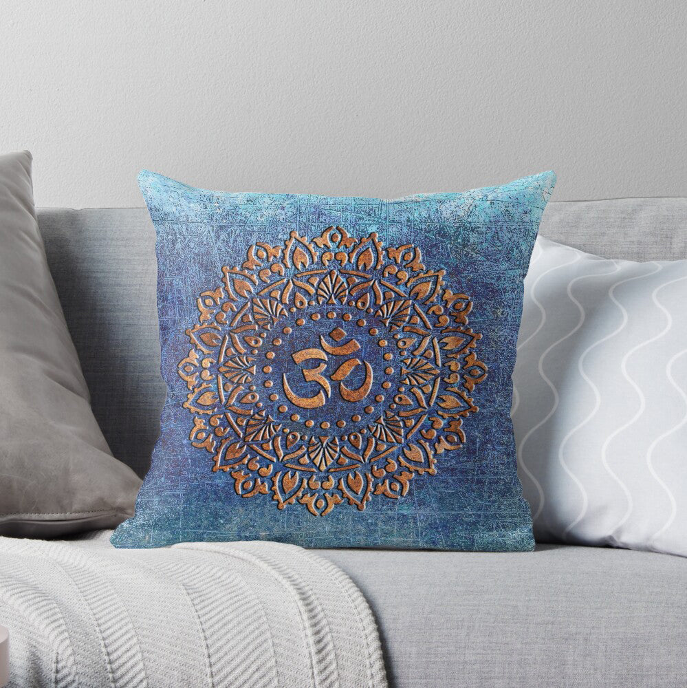 Copper Color Ohm Symbol Mandala Style Print on Distressed Blue Background Square Pillow on sofa